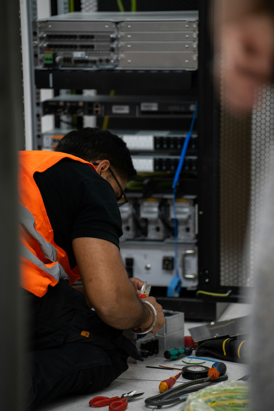 Technician working on server equipment, representing data centre and AI infrastructure careers in Canada