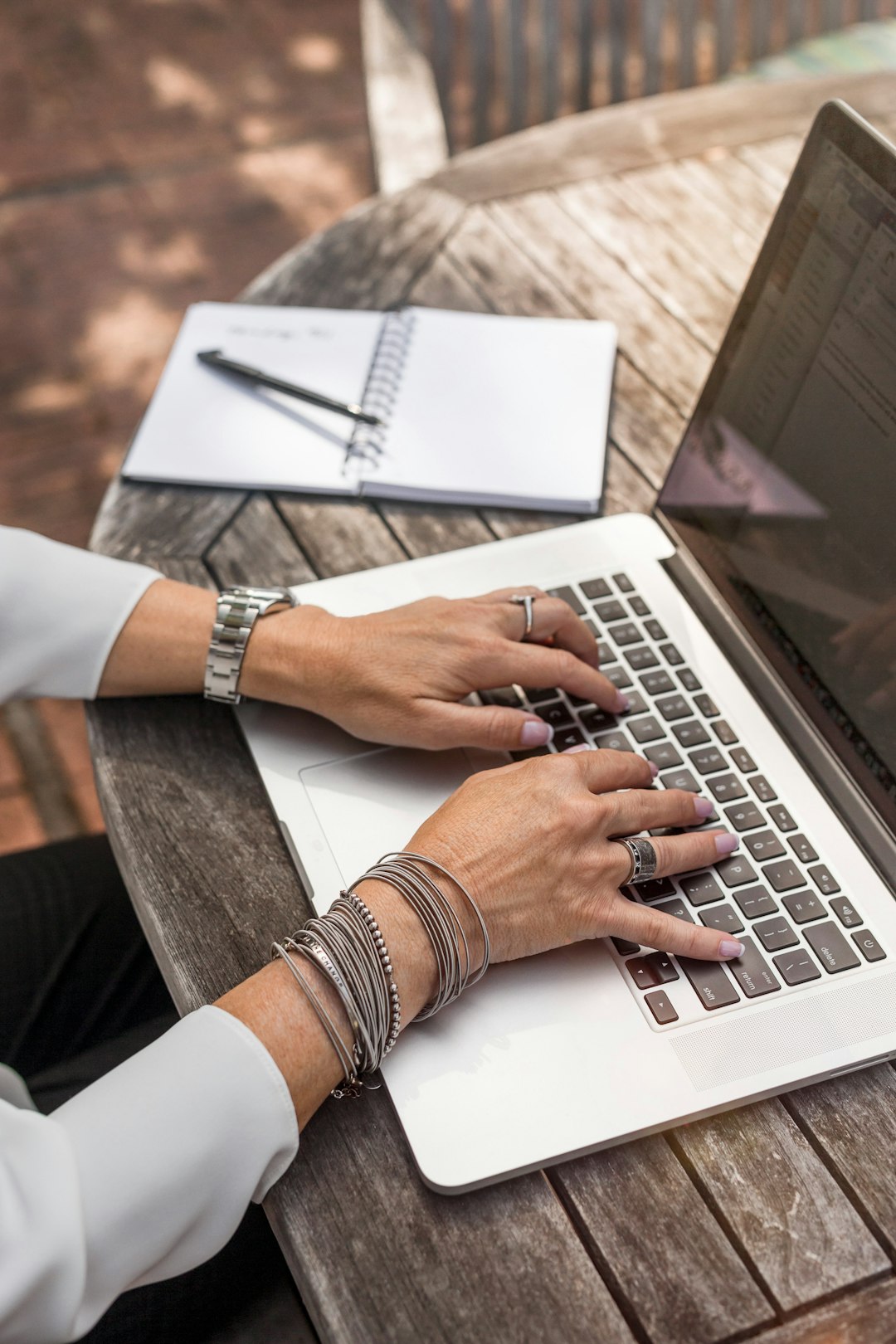 Professional reviewing a job search plan on a laptop